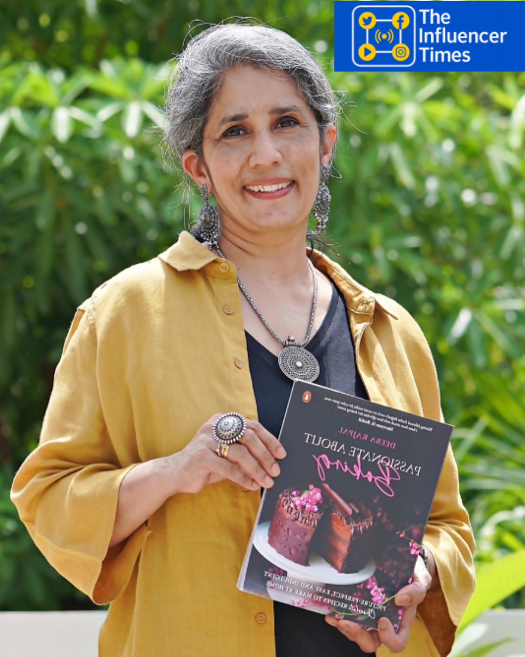 deeba rajpal holding her book